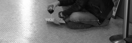 man reading glass wine